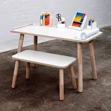White and wooden desk with ikea painting stools. Growing Table Desk For Children That Grows With Them By Pure Position