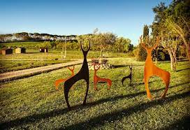 A Herd Of Deer In Sienna Garden Art