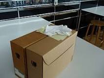 What was the original purpose of cardboard boxes?