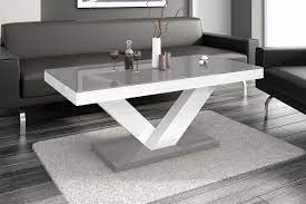There is no need to limit yourself to square or rectangular glass coffee tables. Vincenza Unique High Gloss Rectangular Coffee Table