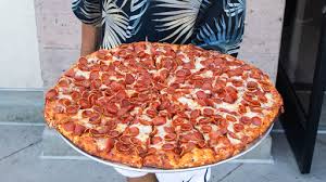 This Mountain Sized Pizza Comes With Over Two Hundred Pepperonis