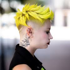 Badass side shave and head tattoo. The 50 Coolest Shaved Hairstyles For Women Hair Adviser