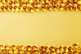 golden capsules of vitamin d3