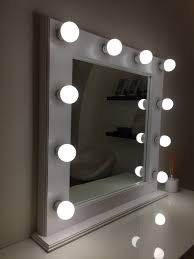 traditional white makeup mirror with