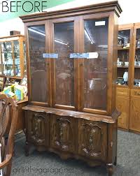painted china cabinet with wallpaper