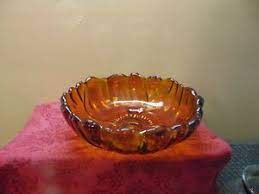 large amber glass footed console