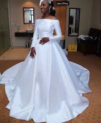 Our elegant wedding dresses are beautifully tailored, and subtly detailed. Bride Looks Stunning In A Simple But Elegant Custom Made Wedding Dress Resembling Meghan Markle S Wedding Gown Wedding Digest Naija