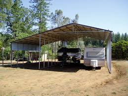 What i discovered once i had the tv's out was a nice storage area that could be utilized if i just had a door to cover the front of each cabinet. Metal Rv Storage And Carports