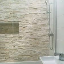 Tile is the one detail that singlehandedly transforms any bathroom. Stone Feature Wall Stone Shower Walls Stone Feature Wall Tile Bathroom