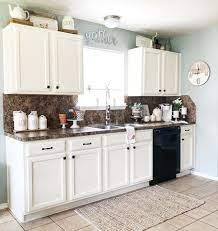 Asymmetrical and natural designs seem to be all the rage in recent times, ruling over kitchen decor ideas. 9 Ways To Decorate Above Your Kitchen Cabinets