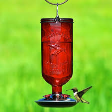 antique bottle hummingbird feeder