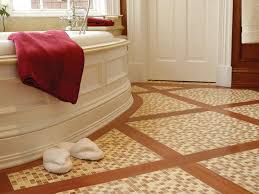 This bathroom features carrara tiles which make it look lavish. Stone Tile Bathroom Floors Hgtv