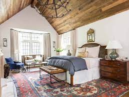 how to place a rug in a bedroom