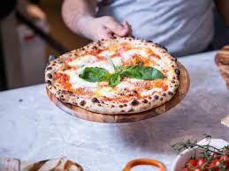 Put plum tomatoes in the pan and chop them up with a spatula. How To Make Pizzas At Home Top Recipe For Margherita Pizza And Dough Secrets Bloomberg