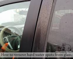 Spread it all over the affected area with a damp towel. How To Remove Hard Water Spots From Glass Daddy By Day Hard Water Spots Water Spots House Cleaning Tips