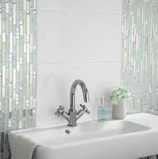 You can try different combinations of porcelains adorned with natural stone or glass or ceramics, you can give create designer style bathroom too. Glass Wall Tiles Uk Paulbabbitt Com