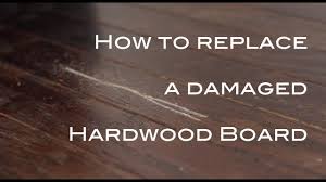 damaged hardwood flooring board