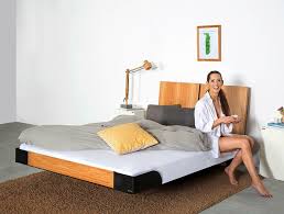 wooden double bed with high headboard