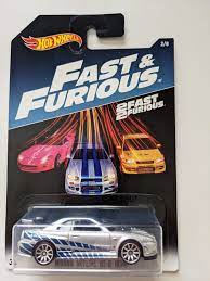 Hot Wheels 2017 Fast and Furious Nissan skyline GT-R R34 silver/blue 2 fast  2 furious 2/8 : Amazon.nl: Toys & Games