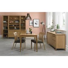 These stylish sets are available in different shapes and colours. Casa Geneva 2 4 Ext Table 2 Oak Dining Set