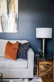 gray floor living room with blue walls