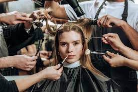doing hairstyle in beauty salon