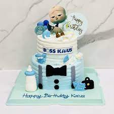 baby boss cake with suitcase milk