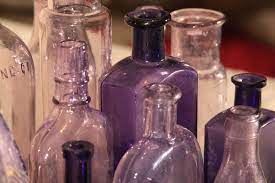 Purple Glass Antique Bottle Collection