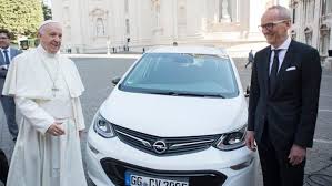 The most unusual part of the scene was when he greeted the armed soldier. Pope Francis Receives Electric Car As Part Of Effort To Create Carbon Free Vatican