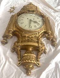 antique louis xvi style wall clock in