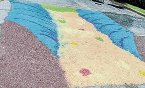 colorful sawdust carpets at new venue