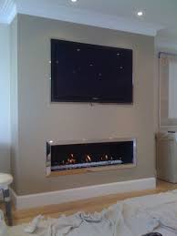 linear fireplace with tile surround and