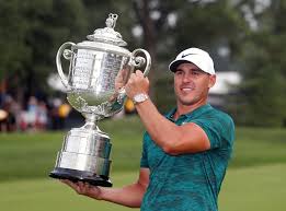 Brooks koepka held off challenges from tiger woods and adam scott to take the us pga title as huge crowds at bellerive cheered tiger through a rollercoaster final round. Pga Championship Brooks Koepka Holds Off Charging Tiger Woods To Win Third Major And Make Golf History The Independent The Independent