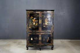 chinese corner cabinet in black lacquer