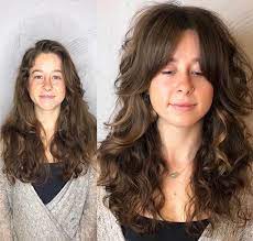 This look is the best of both worlds: Curtain Bangs On Curly Hair Ideas Inspiration Popsugar Beauty