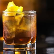 This dark 'n' stormy cocktail looks impressive and tastes amazing! Love Is Spicing It Up