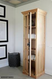 How does your family currently use the linen closet? Diy Linen Cabinet With Glass Door Plans And Tutorial