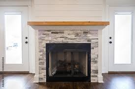 With Tiled Fireplace And Custom Mantle