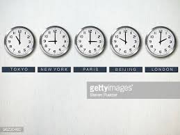 international time zone clocks on wall