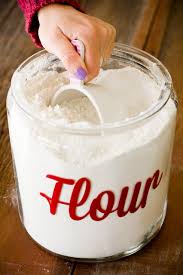 how much is a cup of flour in grams