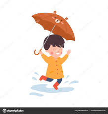 happy boy holding umbrella jumping