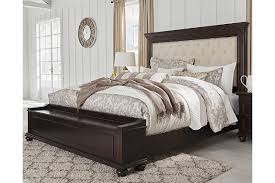 Ashley furniture bedroom / flynnter collection; Brynhurst Queen Upholstered Bed With Storage Bench Ashley Furniture Homestore