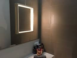 how to add light to poorly lit bathroom