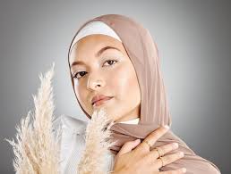 wearing brown headscarf posing