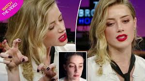amber heard caked herself in makeup