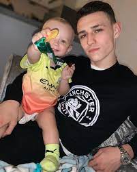 England star Phil Foden became dad at 18 with childhood sweetheart Rebecca  Cooke and bought parents a £2million mansion
