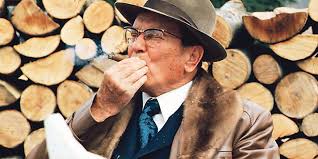 Josip Broz Tito smoking a cigar ...