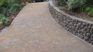 paver driveway and stack retaining wall