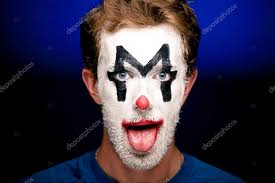 clown makeup on his face stock photo