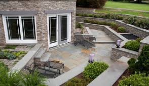 Stacked Stone Patio With Wrought Iron